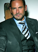 Hary hunk Jason Torres in a torture chair