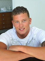 Vance posing in a shower