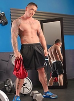 MUscle athlete Slate Steele strokes dick in a gym