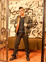 Santos posing naked in a cell