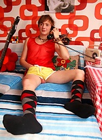 Queer Teen Boy in 70s Retro style room