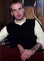 Gay stud masturbating his hard cock inside a barn