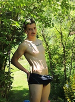 Tattooed Peter Jules masturbating outside in the yard.