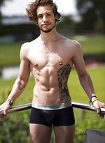 Marco showing his body on balcony